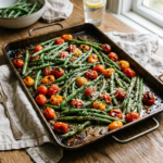 Tray of roasted green beans and cherry with grated parmesan cheese